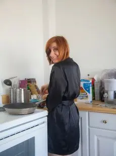 Amateur Redhead Chesea Bell Sheds Her Black Satin Robe To Cook In The Nude