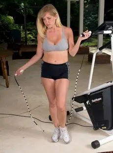 Busty Blonde Milf Exposes Her Big Natural Tits While Working Out At The Gym