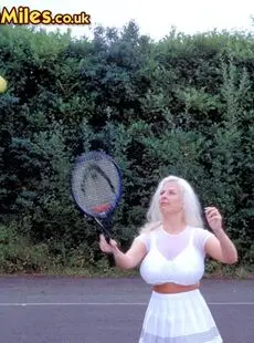 German Female Julia Miles Exposes Her Hooters While Playing Tennis