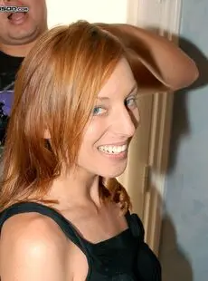 Sexy Redhead Pornstar Lauren Vaughn Exposing Her Fake Boobies In The Bed