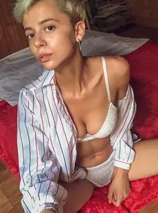 Short Haired Girl Lilly Thomson Dips Her Fingers Into Her Twat After Disrobing