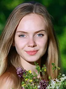 Sweet Teen Girl Puts Down Her Flowers And Proceeds To Model In The Nude