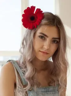 Young Blonde Eva Elfie Shows Off Her Great Body With A Flower In Her Hair