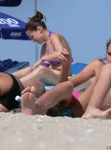 Girls Sunbathing On The Beach Beach 0022