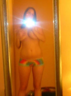 AMALAND amateur babe posing naked with camera