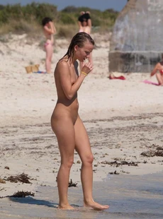 AMALAND cutie walking nude on a beach