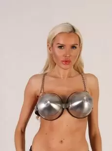 MetalBondage Katia Russian Doll In Stocks