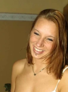 AMALAND pierced redhead gets naked